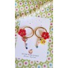 Boucles d'oreilles créoles avec breloques en verre